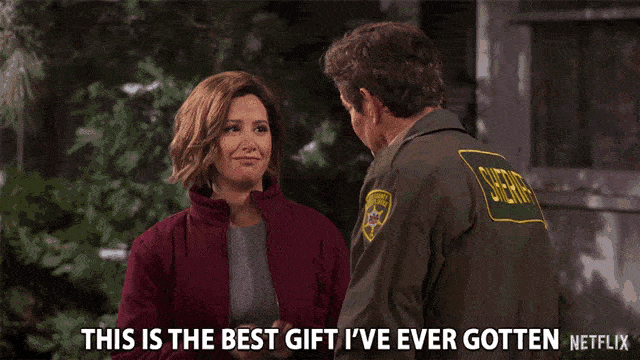 a girl thanking a man saying - this is the best gift i have ever gotten