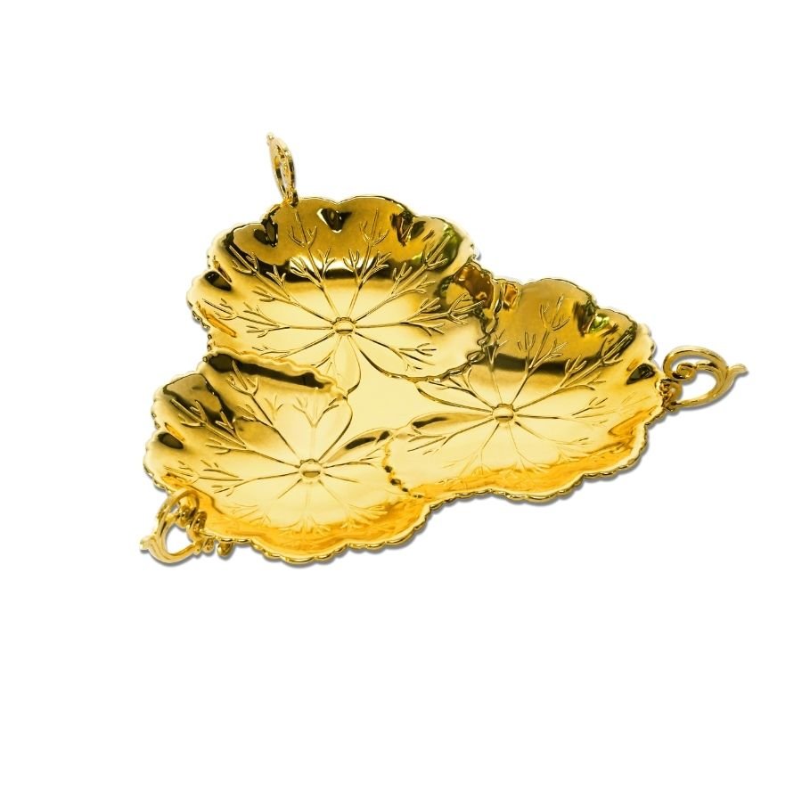 a vibrant 3-sided leaf shaped golden platter with handles